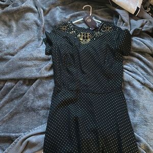 Brand new tag with price still on the dress